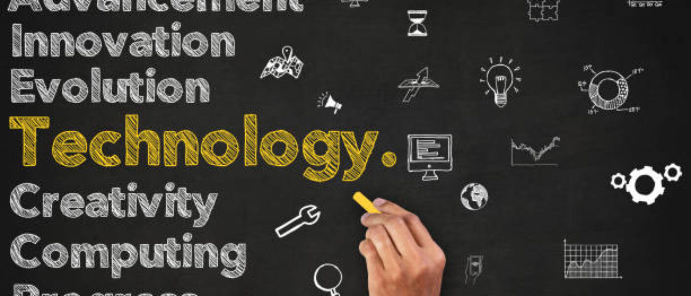 Technology Word On Blackboard With Supportive Icons