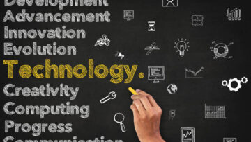 Technology Word On Blackboard With Supportive Icons